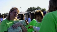 Susan, Cadence (in blanket), and Mary getting ready.